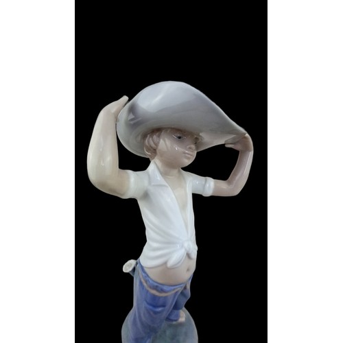 895 - A NAO FIGURINE THE LITTLE COWBOY