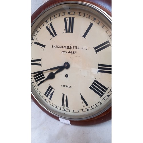 724 - A SCHOOL CLOCK WITH KEY (SHARMAN D NEILL LTD BELFAST)