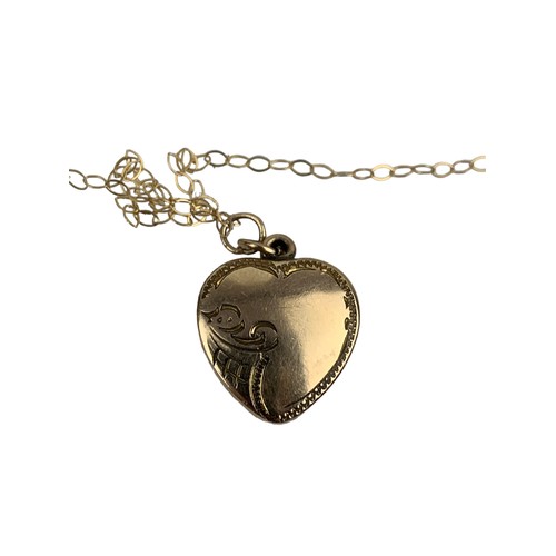 284 - 9ct HEART LOCKET ON A 9ct GOLD CHAIN 2.2grms