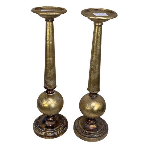 107 - PAIR OF GILT CANDLE STICKS 16