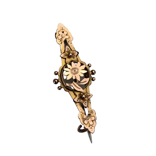 241 - AN ANTIQUE GOLD FLORAL DESIGNER BROOCH