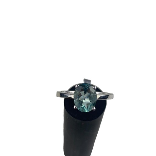 299 - SILVER BLUE TOPAZ RING