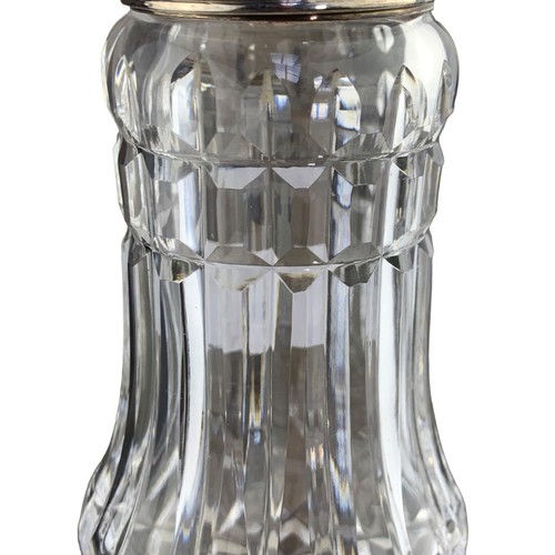 302 - A CUT GLASS SUGAR SHAKER WITH HALLMARKED SILVER TOP 8.5