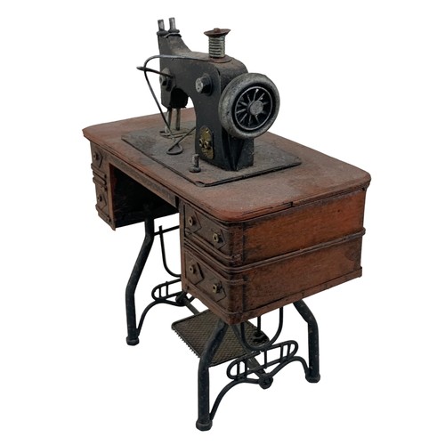 404 - A MINITURE TABLE SEWING MACHINE (ORNAMENTAL)