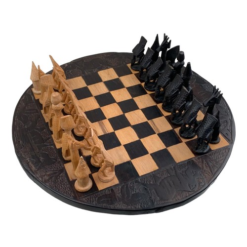 83 - A CARVED AFRICAN (KENYA) CHESS SET