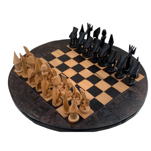 83 - A CARVED AFRICAN (KENYA) CHESS SET