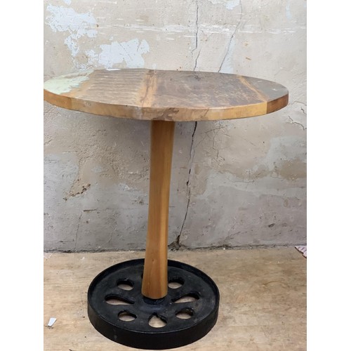 109 - A RECLAIMED WOOD TABLE ON CAST BASE 22