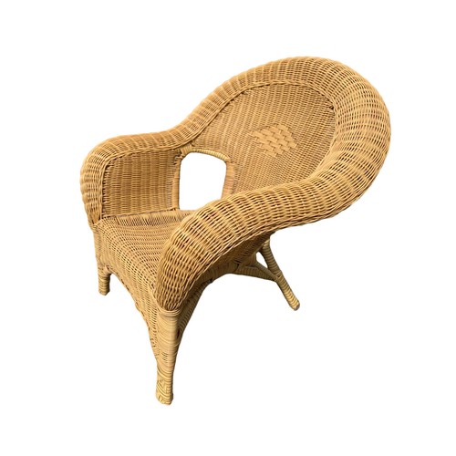 110 - A CHILDS WICKER ARMCHAIR