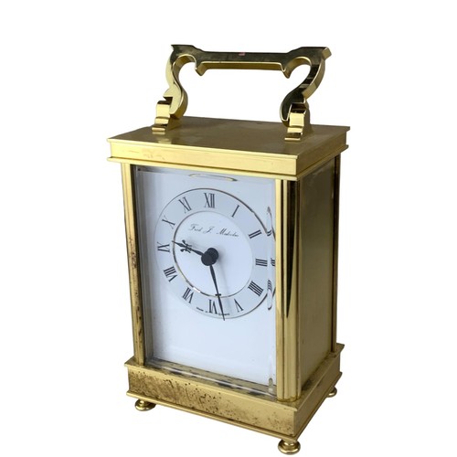 134 - A BATTERY CARRIAGE CLOCK