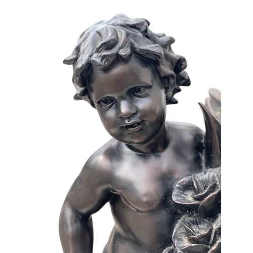 141 - A BRONZED FINISH CHERUB LAMP