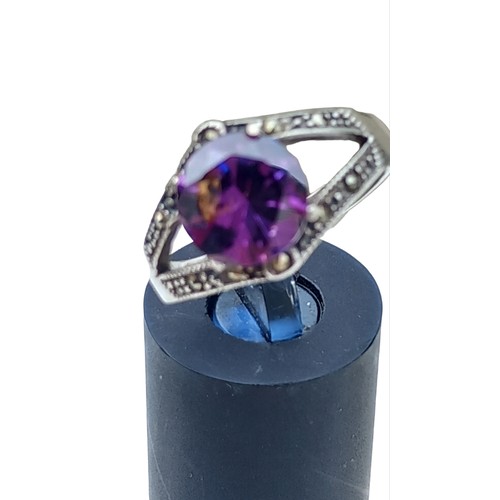 219 - A SILVER MARCASITE AND AMETHYST RING (BOXED)