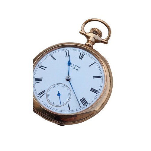 234 - AN ELGIN GOLD PLATED POCKET WATCH WITH A WOODEN  STAND