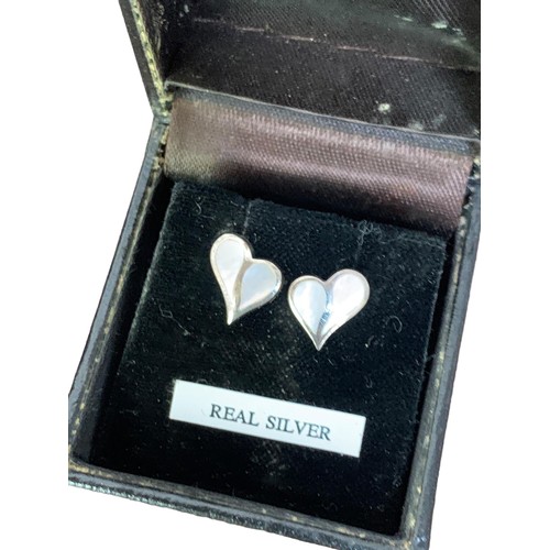 251 - A SILVER HEART SHAPED MOTHER OF PEARL SET EARRINGS