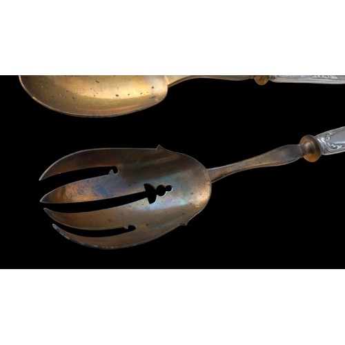 263 - A FRENCH SILVER HANDLED SERVING SPOONS