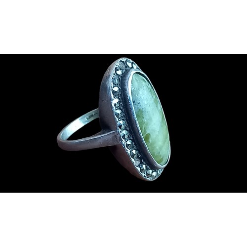 290 - AN ANTIQUE SILVER CONNEMARA MARBLE MARACASITE SET RING