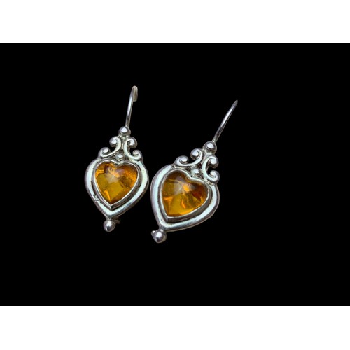 301 - A PAIR OF SLVER AMBER SET EARRINGS