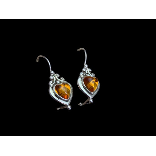 301 - A PAIR OF SLVER AMBER SET EARRINGS