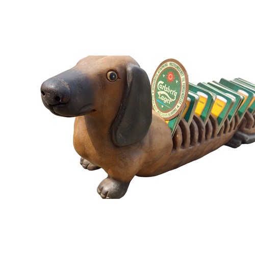 331 - A SAUSAGE DOG RACK