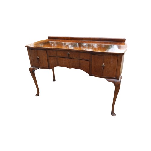 36 - A SHAPED CAB LEGGED DRESSING TABLE