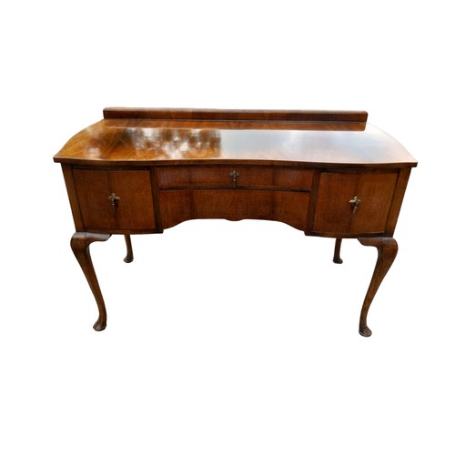 36 - A SHAPED CAB LEGGED DRESSING TABLE