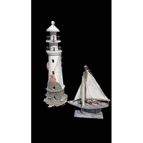 44 - LIGHTHOUSE AND BOAT ORNAMENTS