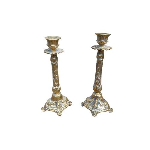 49 - A PAIR OF ORNATE BRASS CANDLESTICKS 9