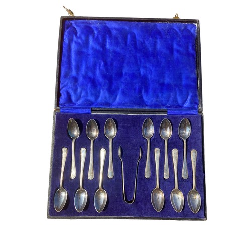 53 - A CASED SET OF 12 SPOONS & EP TONGS