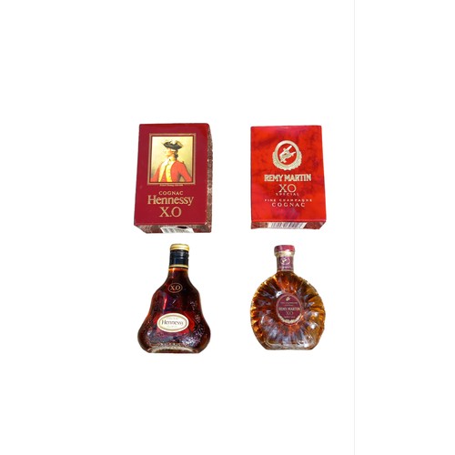 60 - 2 BOXED HENNESSY AND REMY MARTIN MINITURES