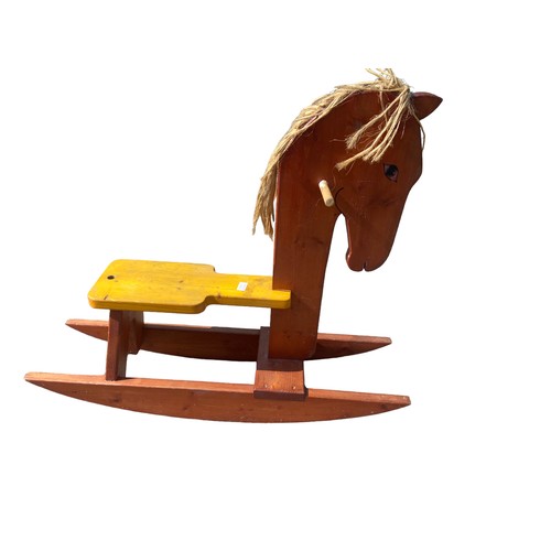 66 - A LARGE WOODEN ROCKING HORSE 33