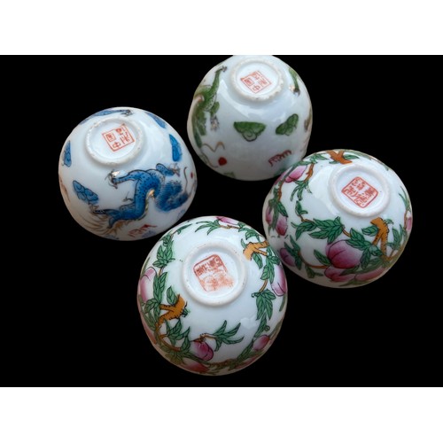 155 - 4 ORIENTAL SAKI CUPS WITH MARKINGS TO BASE