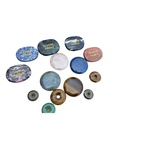 69 - A COLLECTION OF NATURAL STONE DISCS