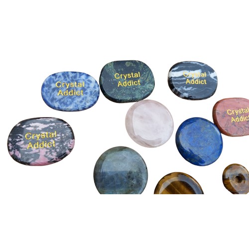 69 - A COLLECTION OF NATURAL STONE DISCS