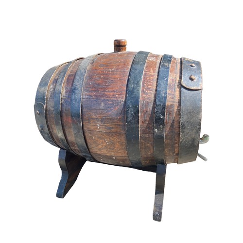 110 - A MINITURE WOODEN BARRELL DRINKS KEG