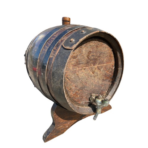 110 - A MINITURE WOODEN BARRELL DRINKS KEG