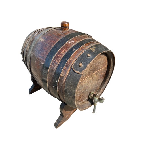 110 - A MINITURE WOODEN BARRELL DRINKS KEG