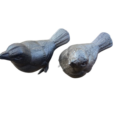 34 - 2 CAST BIRD ORNAMENTS