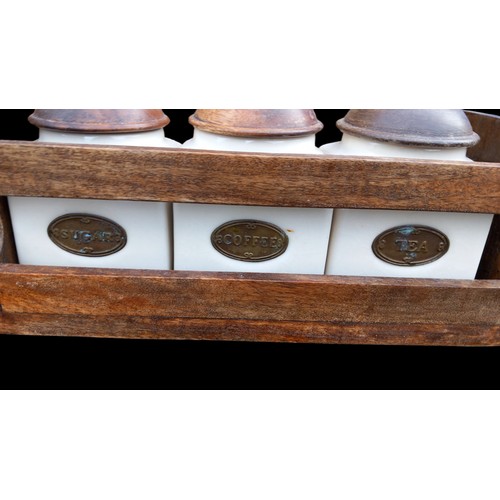 74 - TEA,COFFEE,SUGAR CADDIES IN WALL MOUNT RACK