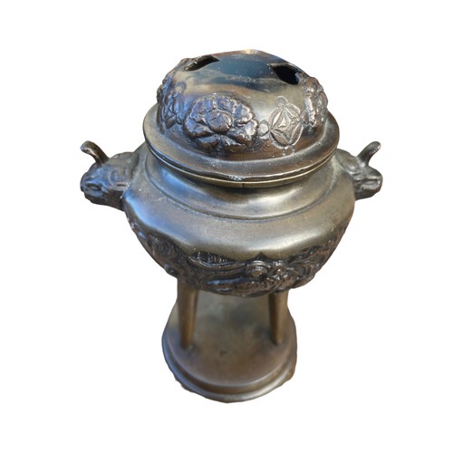 214 - AN ORIENTAL INSENCE BURNER DEPICTING DRAGONS WITH SERPENT HEAD HANDLES IN A BRONZE STYLE FINISH 6