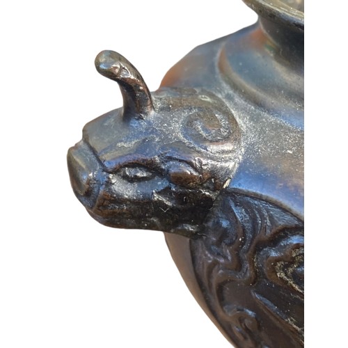 214 - AN ORIENTAL INSENCE BURNER DEPICTING DRAGONS WITH SERPENT HEAD HANDLES IN A BRONZE STYLE FINISH 6