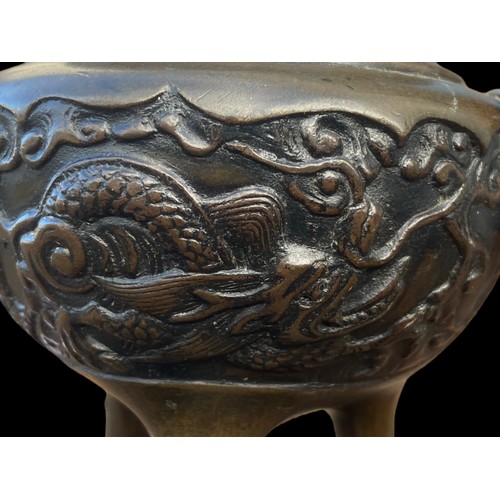 214 - AN ORIENTAL INSENCE BURNER DEPICTING DRAGONS WITH SERPENT HEAD HANDLES IN A BRONZE STYLE FINISH 6