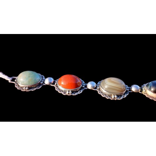 222 - A SILVER 6 PANEL AGATE STONE SET BRACELET