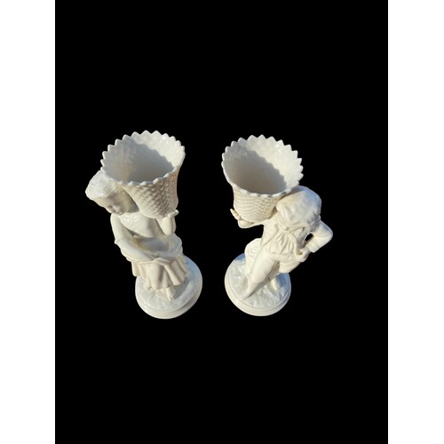 233 - A PAIR OF BELLEEK WATER CARRIERS 8.5