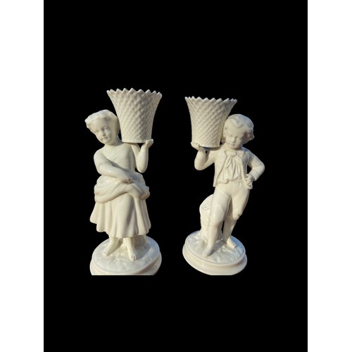 233 - A PAIR OF BELLEEK WATER CARRIERS 8.5