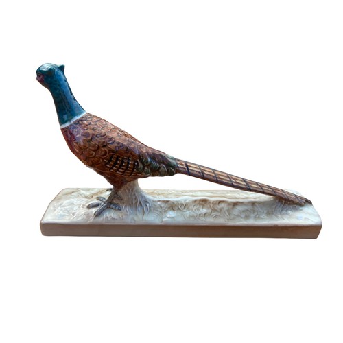 235 - A CERAMIC BESWICK PHEASANT ON PLINTH 8.5 x 6