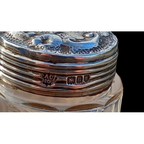 243 - A LONDON 1908 SILVER TOPPED ORNATE LIDDED JAR BY The Alexander Clark Manufacturing Co