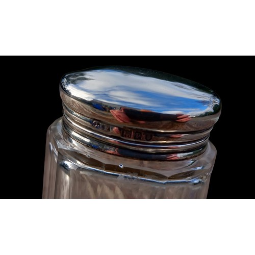 299 - A LONDON SILVER TOPPED JAR