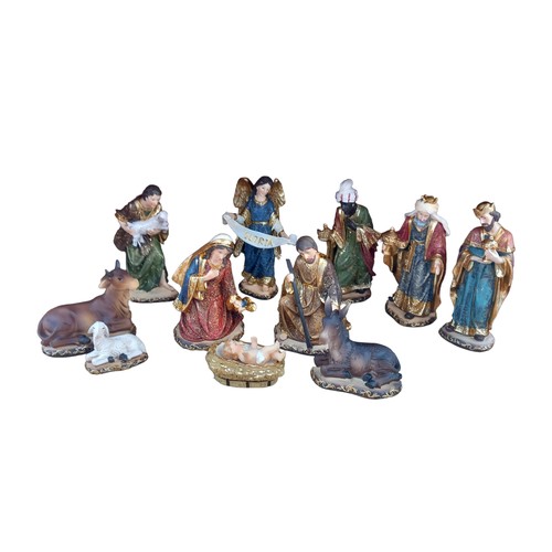 147 - A GOOD QUALITY NATIVITY SET WITH A LIGHT UP MANGER