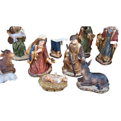 147 - A GOOD QUALITY NATIVITY SET WITH A LIGHT UP MANGER