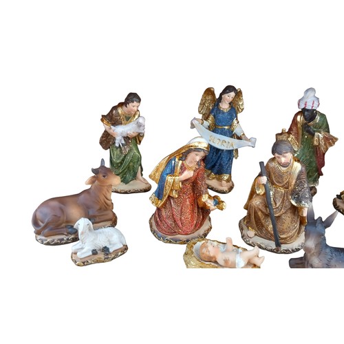 147 - A GOOD QUALITY NATIVITY SET WITH A LIGHT UP MANGER