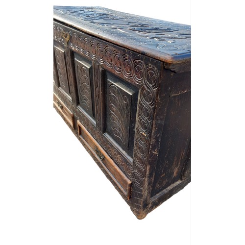 389 - AN 18c CARVED OAK COFFER WITH 2 DRAWERS TO BASE 53 x 22 x 29